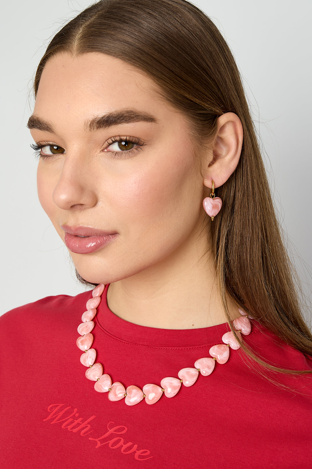 Earrings with heart-shaped beads