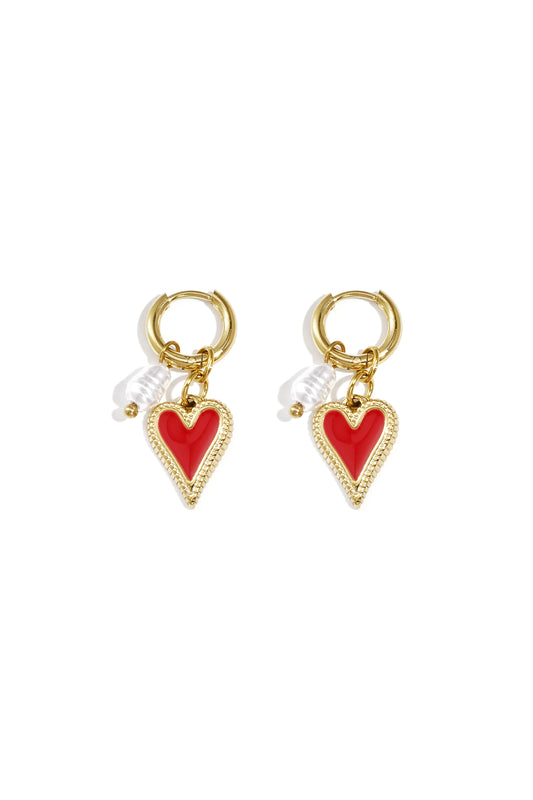 Earrings with hanging heart and pearl